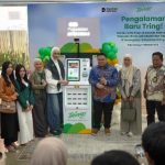 ATM Emas Pegadaian di Cabang Palembang terintegrasi dengan aplikasi Tring! untuk pengambilan emas batangan 1–100 gram.